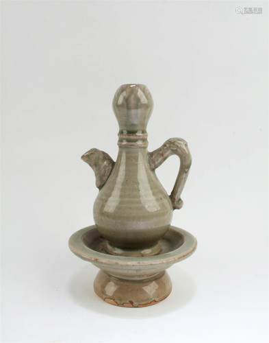 A Porcelain Ewer cum Saucer