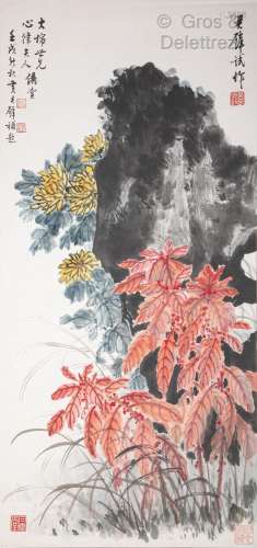 Une composition florale devant un rocher par Huang Junbi sig...
