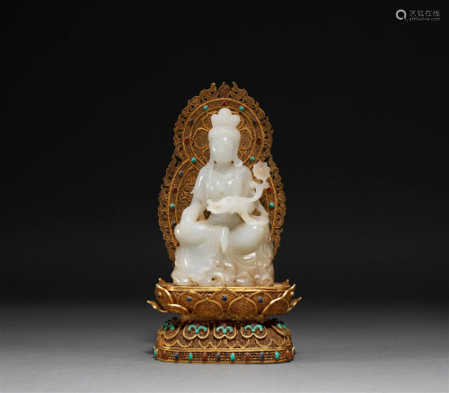 A Carved Jade Guanyin Statue with Gold Base