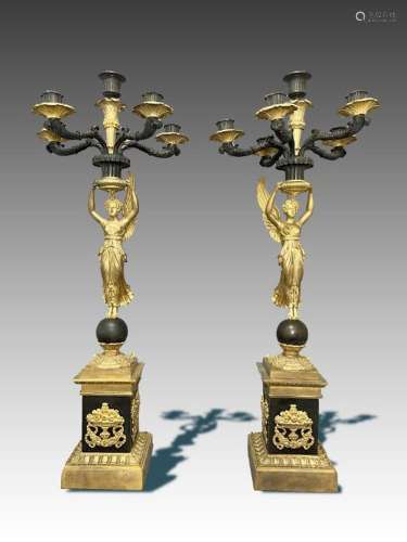 A PAIR OF FRENCH GILT AND PATINATED BRONZE CANDELABRA OF EMP...