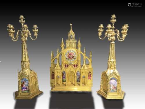 A patinated and gilt bronze cathedral clock garniture with p...