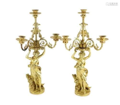 A pair of French ormolu four light candelabras, Napoleon III...