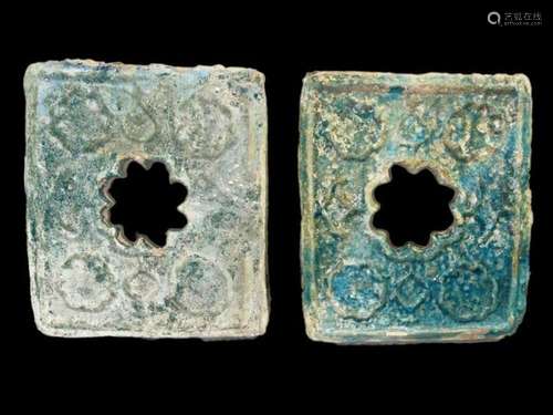 A PAIR OF RAQQA MOULDED MONOCHROME POTTERY TILES SYRIA, 12TH...