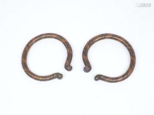 A pair of Roman bi-coloured copper and bronze bracelets 1st ...