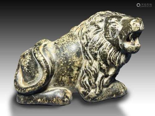 A Roman Granite Statuette Of A Reclining Lion 2nd-3rd Centur...