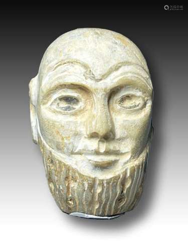 A RARE WESTERN ASIATIC STONE PENDANT OF A PRIEST, CIRCA 1ST ...