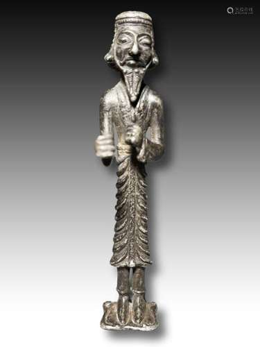 A SILVER ACHAEMENID FIGURE OF A BEARDED MAN CIRCA 4TH CENTUR...