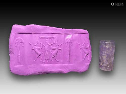 A BABYLONIAN AMETHYST CYLINDER SEAL CIRCA 1900-1700 B.C.