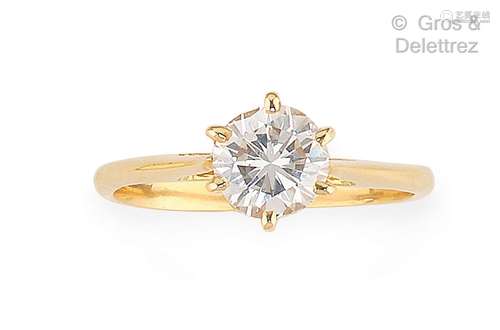 Bague « Solitaire » en or jaune, ornée d’un diamant taillé e...