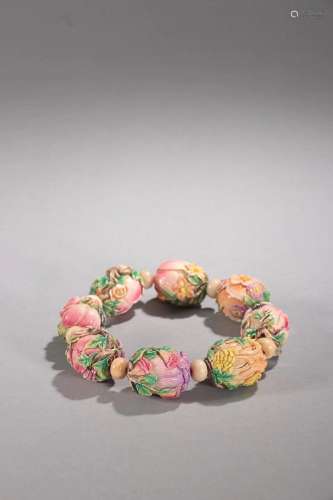CHINESE POLYCHROMED RARE MATERIAL BEADED BRACELET WITH CARVE...