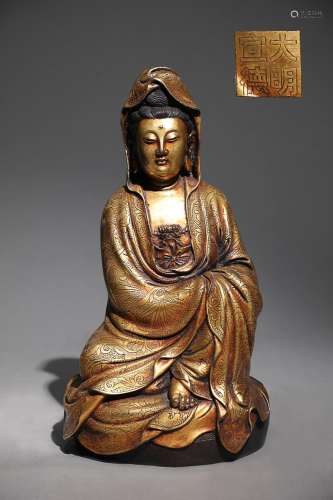 CHINESE GILT-BRONZE FIGURE OF GUANYIN, 'MING XUANDE'...