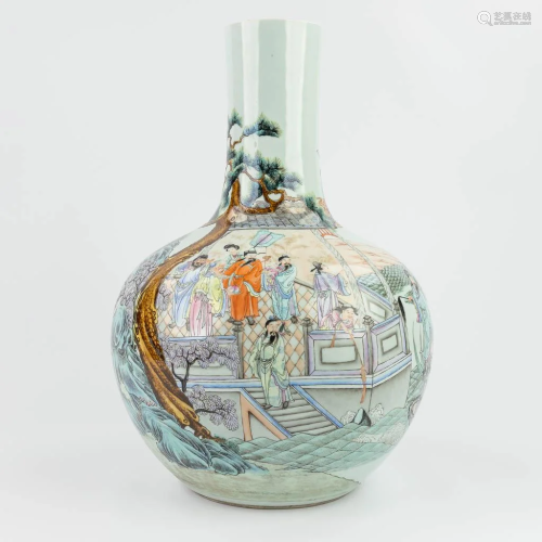 A Chinese ball vase made of glazed porcelain, marked Qianlon...