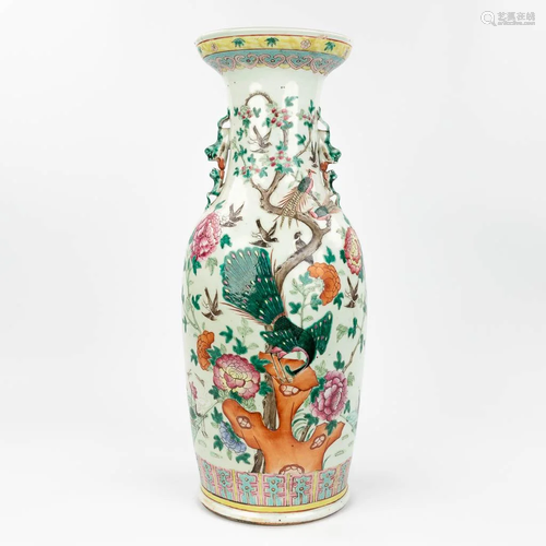 A Chinese vase made of porcelain, decorated with peacocks an...