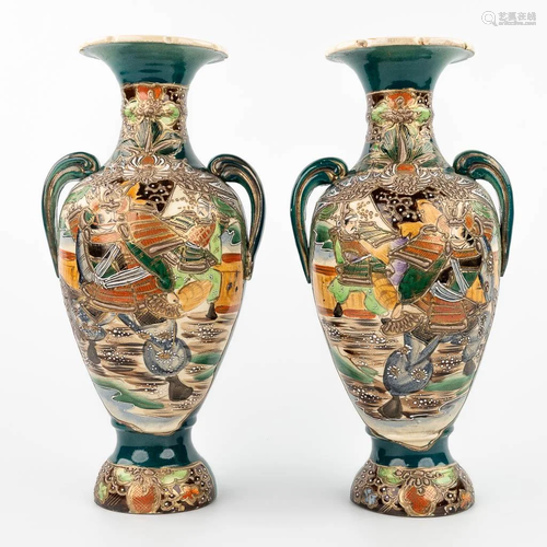 A pair of Japanese vases made of stoneware and decorated wit...