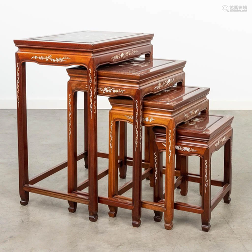 A collection of 4 cigogne side tables made of hardwood and d...