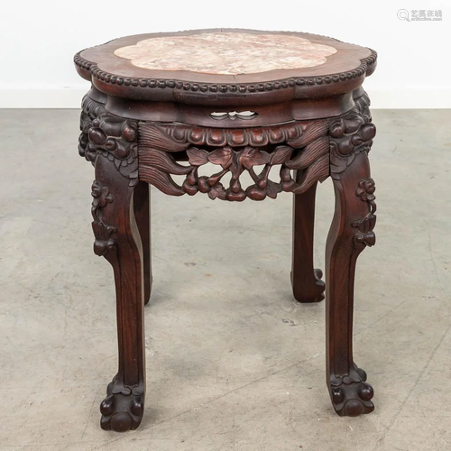 An oriental hardwood stand, finished with a marble top. (41 ...