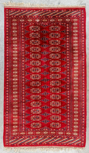 An Oriental hand-made carpet, Bokhara. (154 x 95 cm)