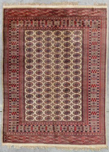 An Oriental hand-made carpet, Bokhara. (340 x 260 cm)