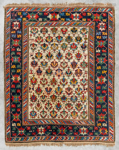 An Oriental hand-made carpet, Daghestan. (130 x 105 cm)