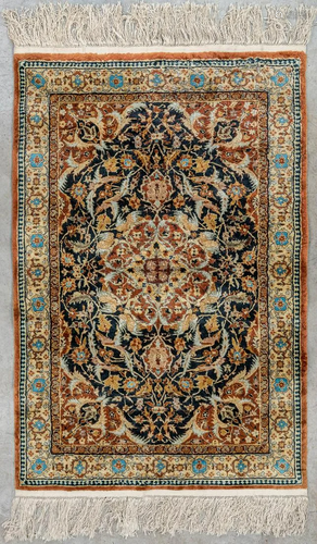 An Oriental hand-made carpet, made in China. (138 x 92 cm)