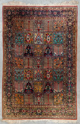 An Oriental hand-made carpet, Ghom Silk (166 x 109 cm)