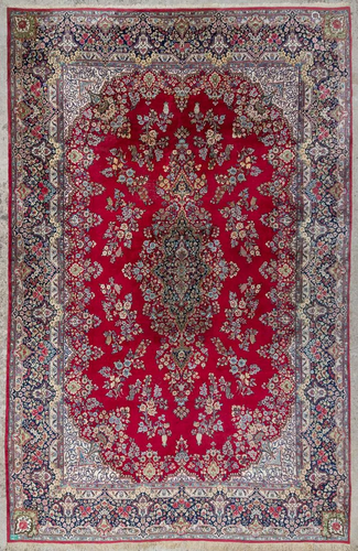 An Oriental hand-made carpet, Kirman. (565 x 365)