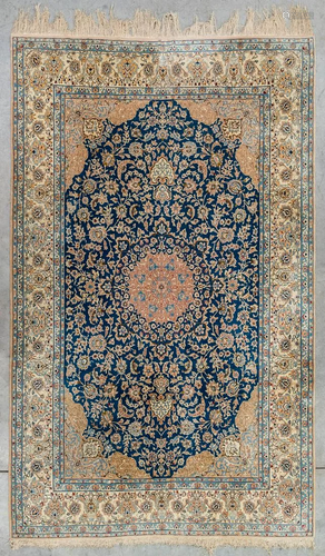 An Oriental hand-made carpet, Nain. (343 x 205 cm)