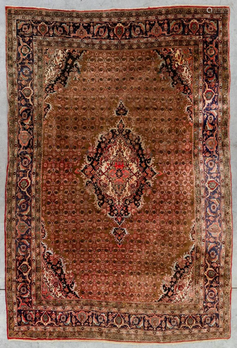 An Oriental hand-made carpet, Kashan. (340 x 230 cm)