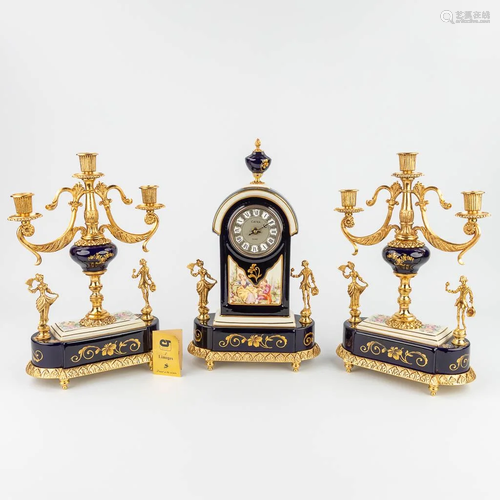 Limoges, a three-piece mantle garniture clock and candelabra...