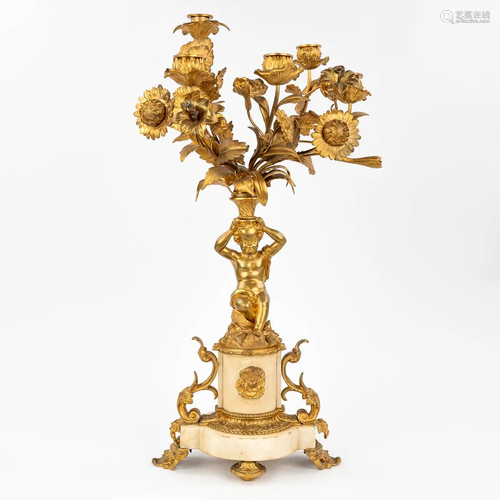 A candelabra made of white marble, mounted with gilt bronze ...