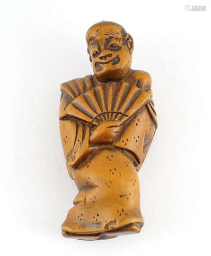 JAPON / JAPANNetsuke en bambou, représentant un homme à l’év...