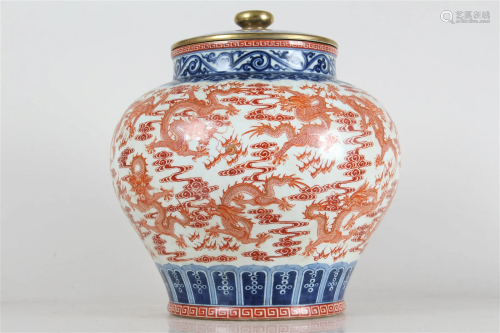 A Chinese Lidded Vividly-detailed Dragon-decorating Porcelai...