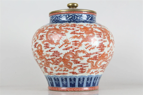 A Chinese Lidded Vividly-detailed Dragon-decorating Porcelai...