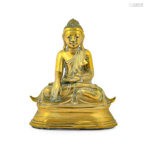 A Chinese Bronze Buddha, in 17th century style, sitting in t...