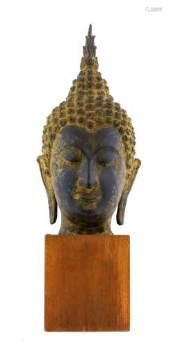 A Bronze Buddha Head, in 17th century style, with flammiform...