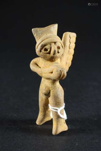 Guerrier siffleur. Figurine en terre cuite. Mexique. Hauteur...