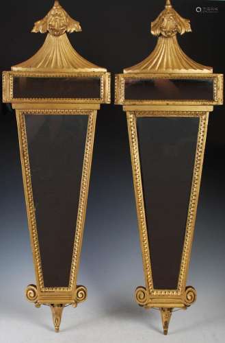 A pair of 19th century giltwood wall mirrors, of tapering na...