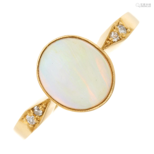 An 18ct gold opal cabochon dress ring, w