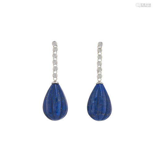 A pair of 18ct gold carved lapis lazuli