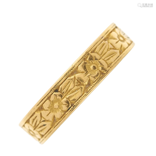 A mid 20th century 22ct gold floral band