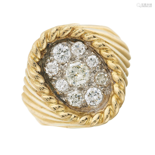 An 18ct gold brilliant-cut diamond clust