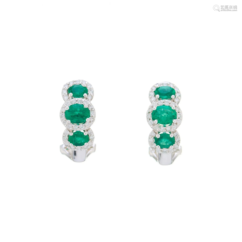 A pair of 14ct gold oval-shape emerald a