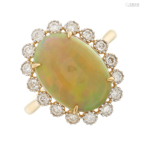 An 18ct gold opal cabochon and brilliant