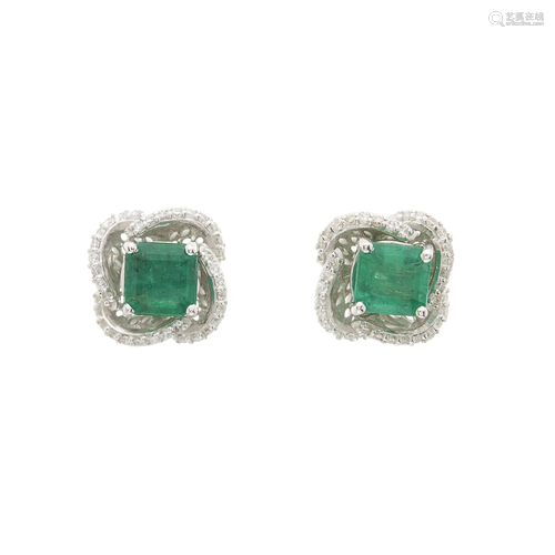 A pair of 18ct gold emerald and brillian