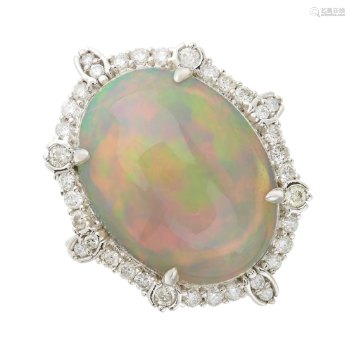 An 18ct gold opal cabochon and brilliant