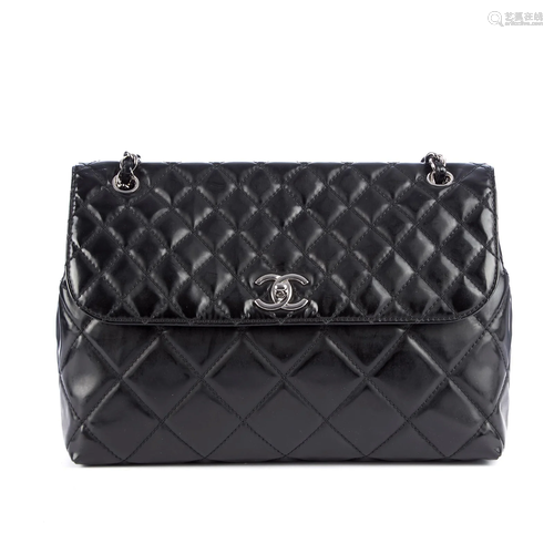 Chanel, a black quilted Single Flap hand