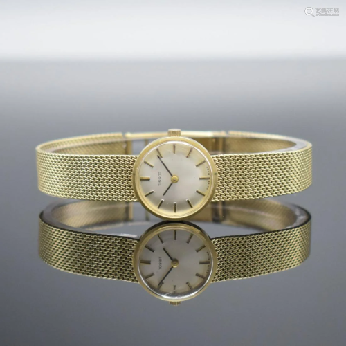 TISSOT 14k yellow gold ladies wristwatch
