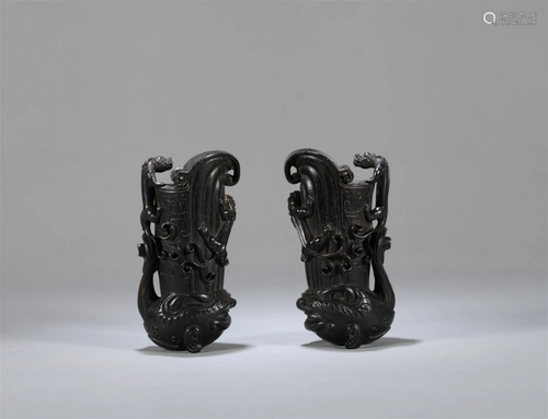 A Pair of Chinese Carved Hardwood Cups