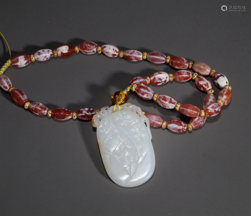 A Chinese Carved Jade Pendant Necklace