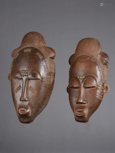 A Baule Pair of Masks, "mblo"